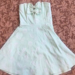 Mint green dress.